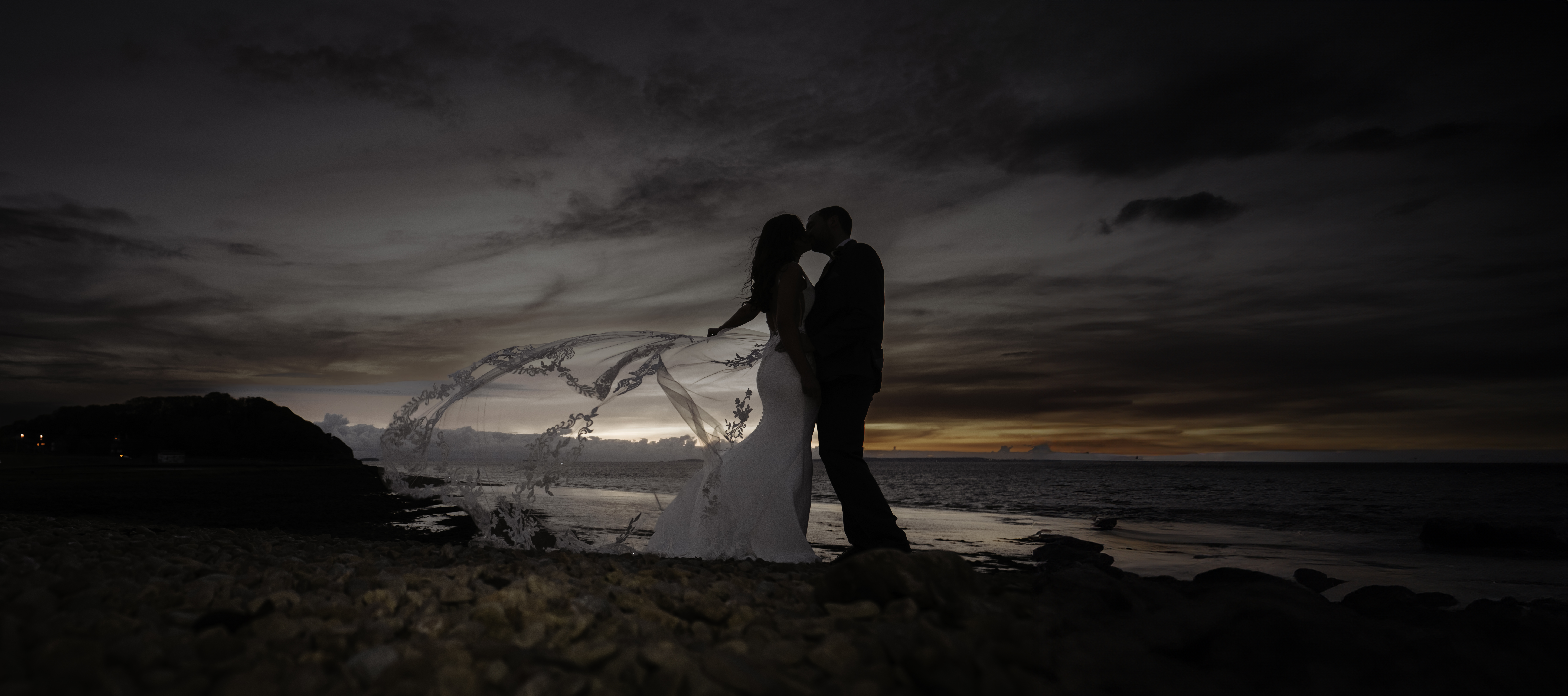 Bride and Groom during golden hour on Clevedon Beach
